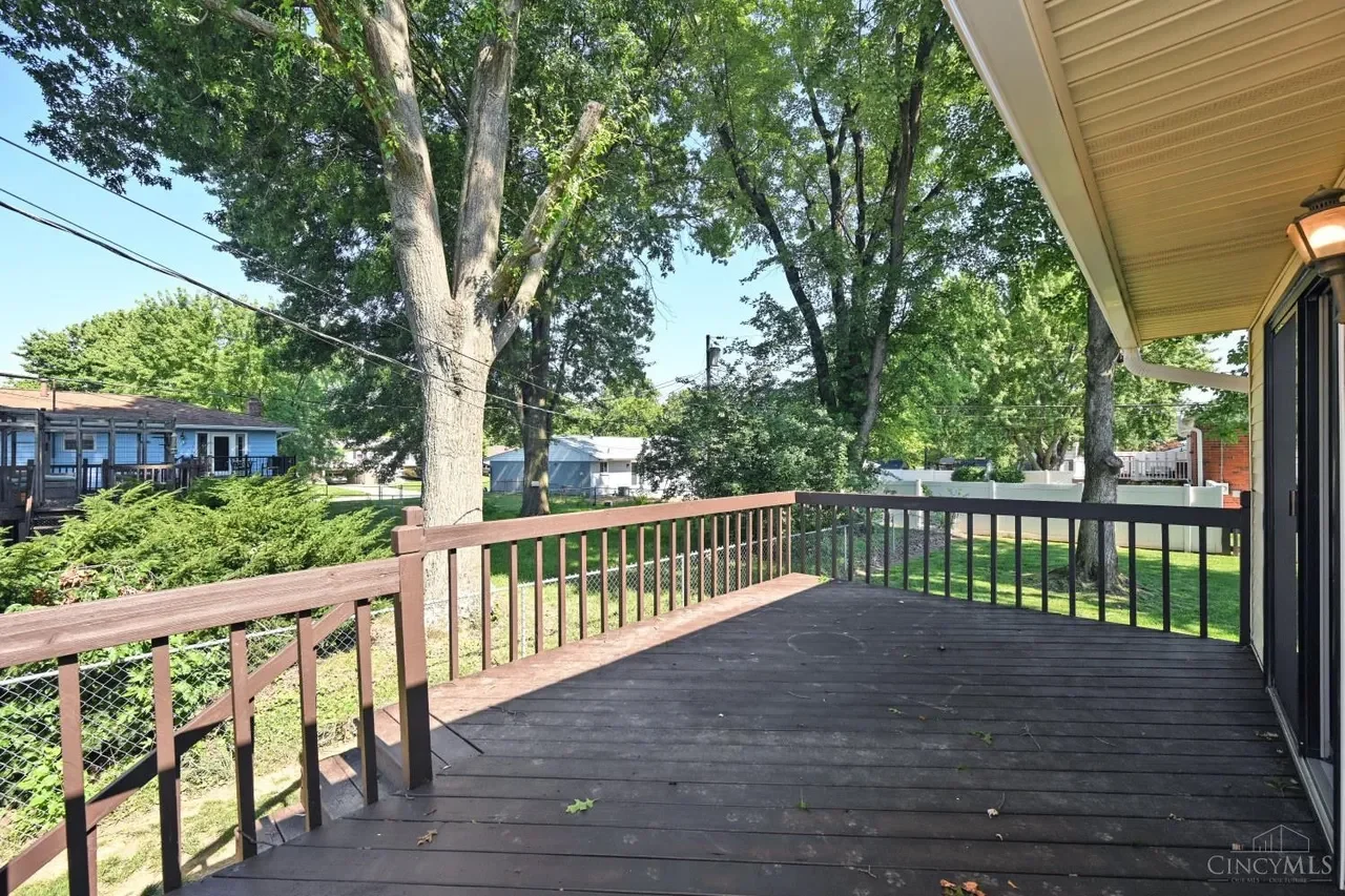 Wooden deck overlooking the backyard